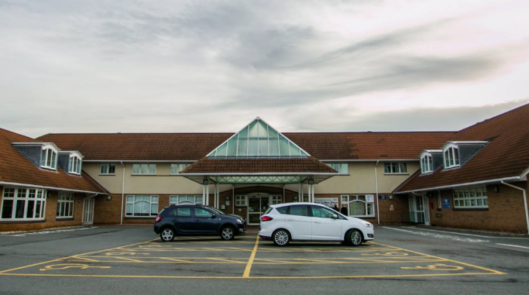 A photo of the outside of Pioneering Care Centre