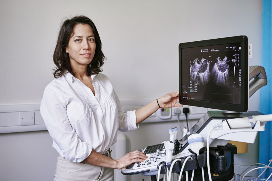 Clinician operating an ultrasound machine