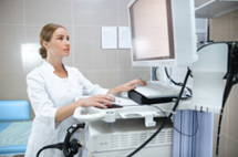 Clinician operating an endoscopy machine